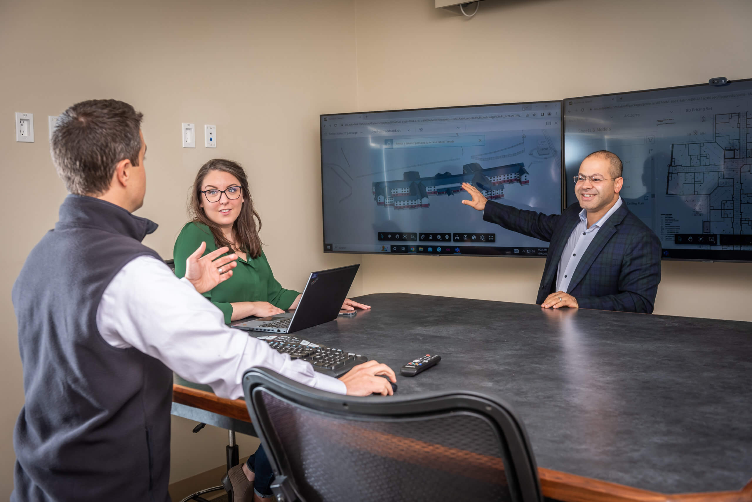 Decorative photo of three people in a meeting