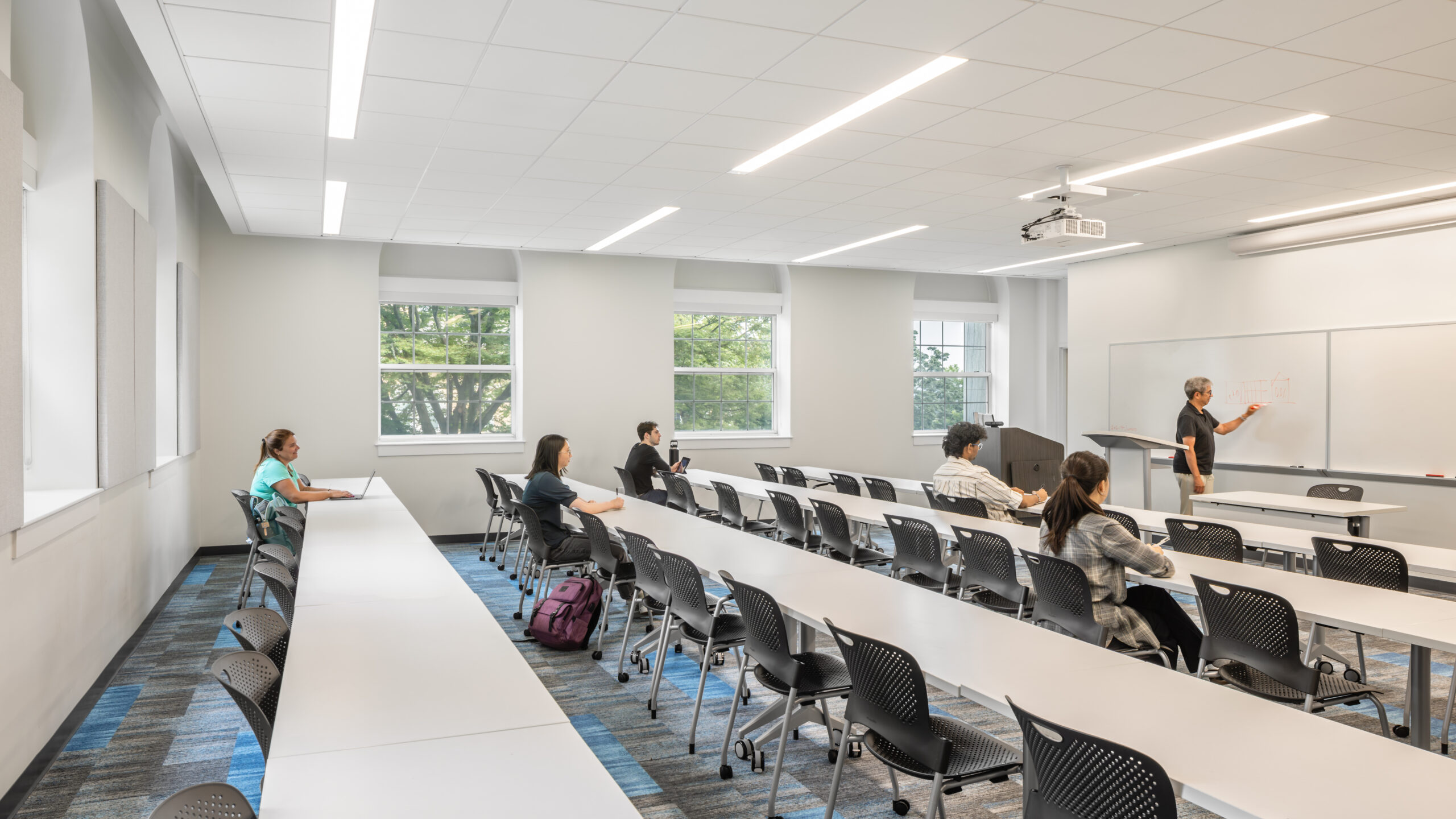 Tufts Eaton Hall Classroom Classroom set up with long tables in rows